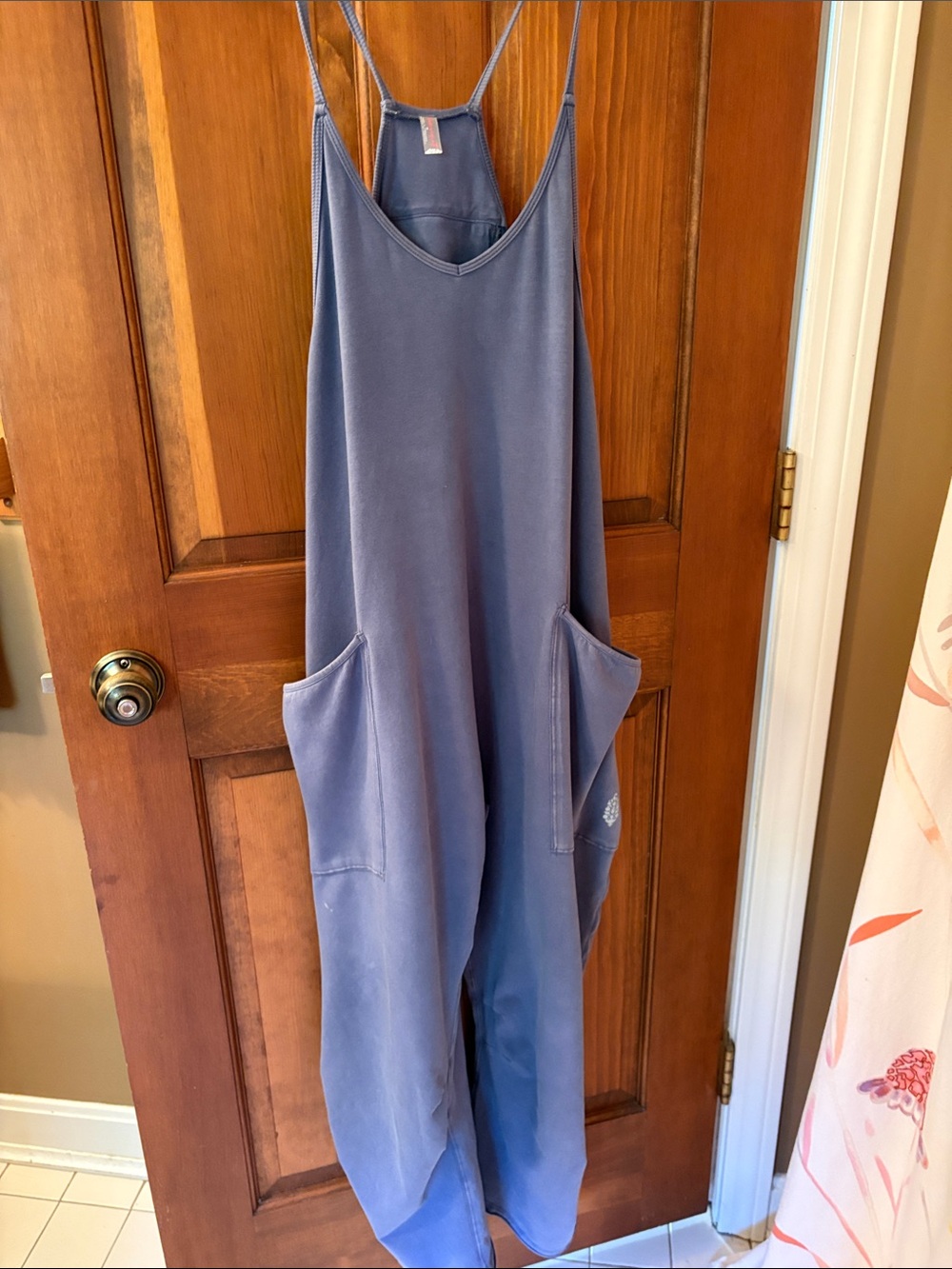 Free people movement Slate blue jumpsuit  with pockets.